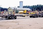 Chehalis Western log car #88. MILW 619 & ex SP caboose in background.